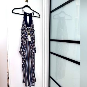 Multi color midi dress with pockets. Cute for any occasion.